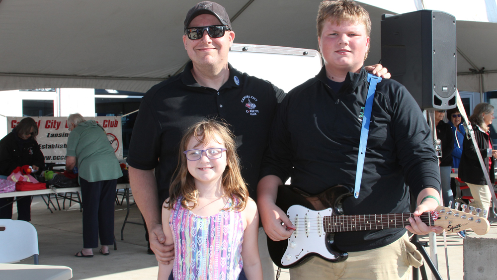 Kyle and his kids at the Children's Miracle Network fundraiser in September 2023.